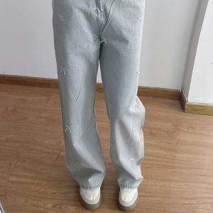 QUẦN JEANS SUÔNG ĐÍNH ĐÁ VÀ NƠ