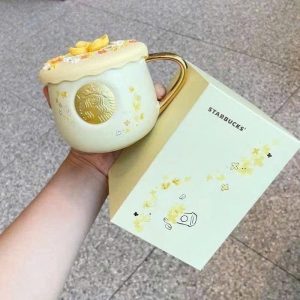 Cốc sứ hoa vàng Starbu.ck